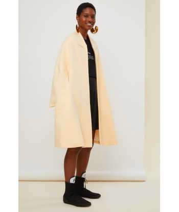 Oversized lambswool coat s'inspire de l'anatomie humaine